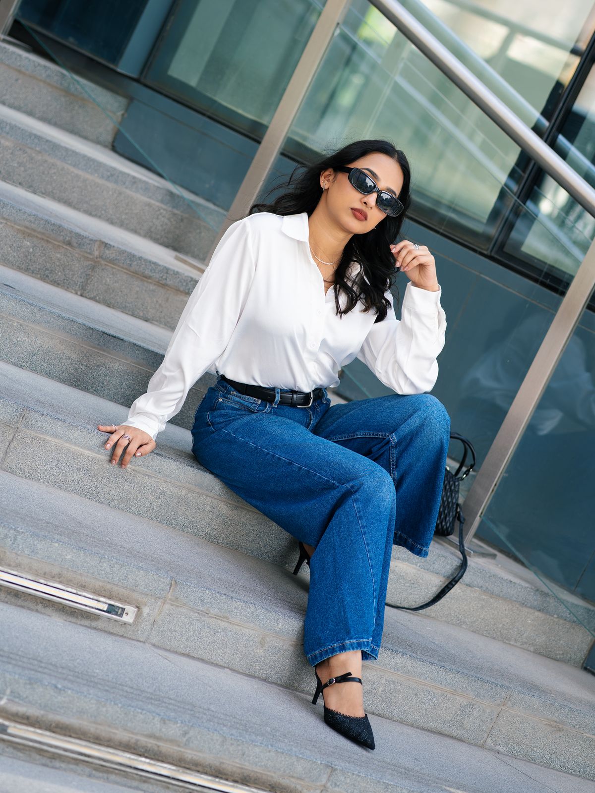 Olivia — seated on the steps