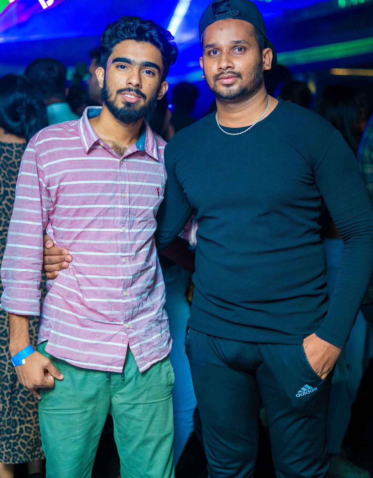 Night out — two friends at the rail
