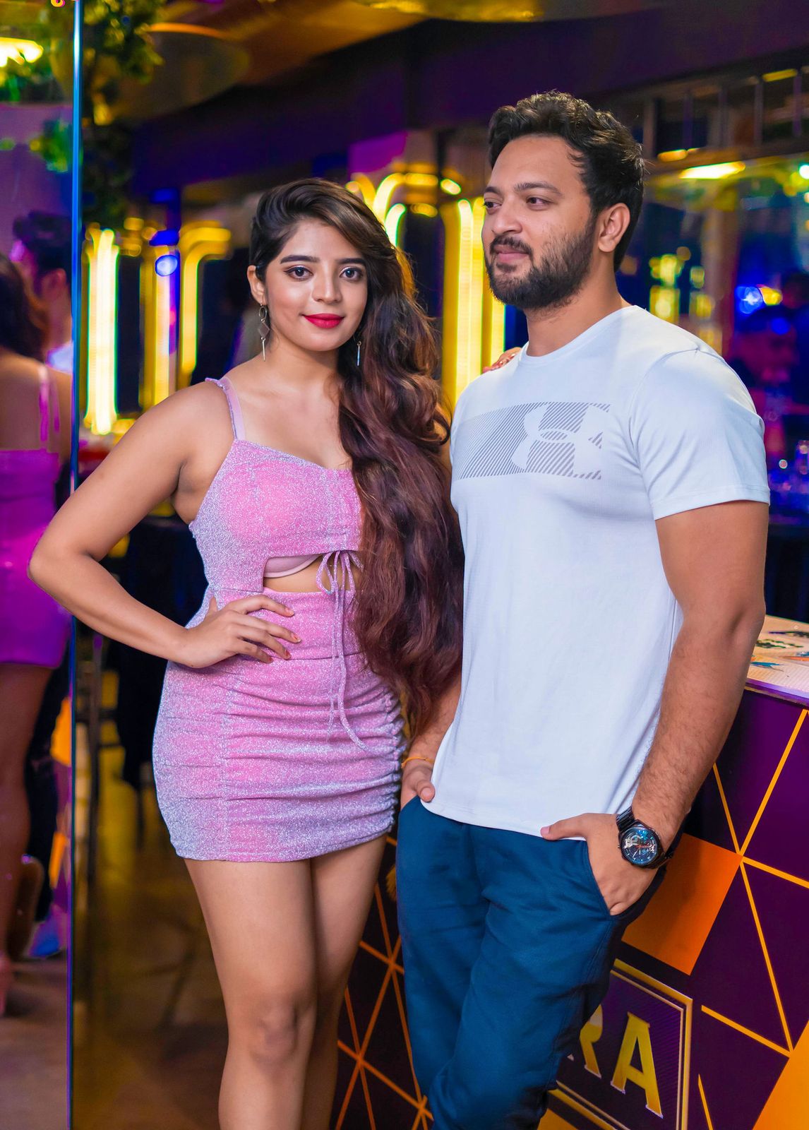 Night out — the couple by the bar