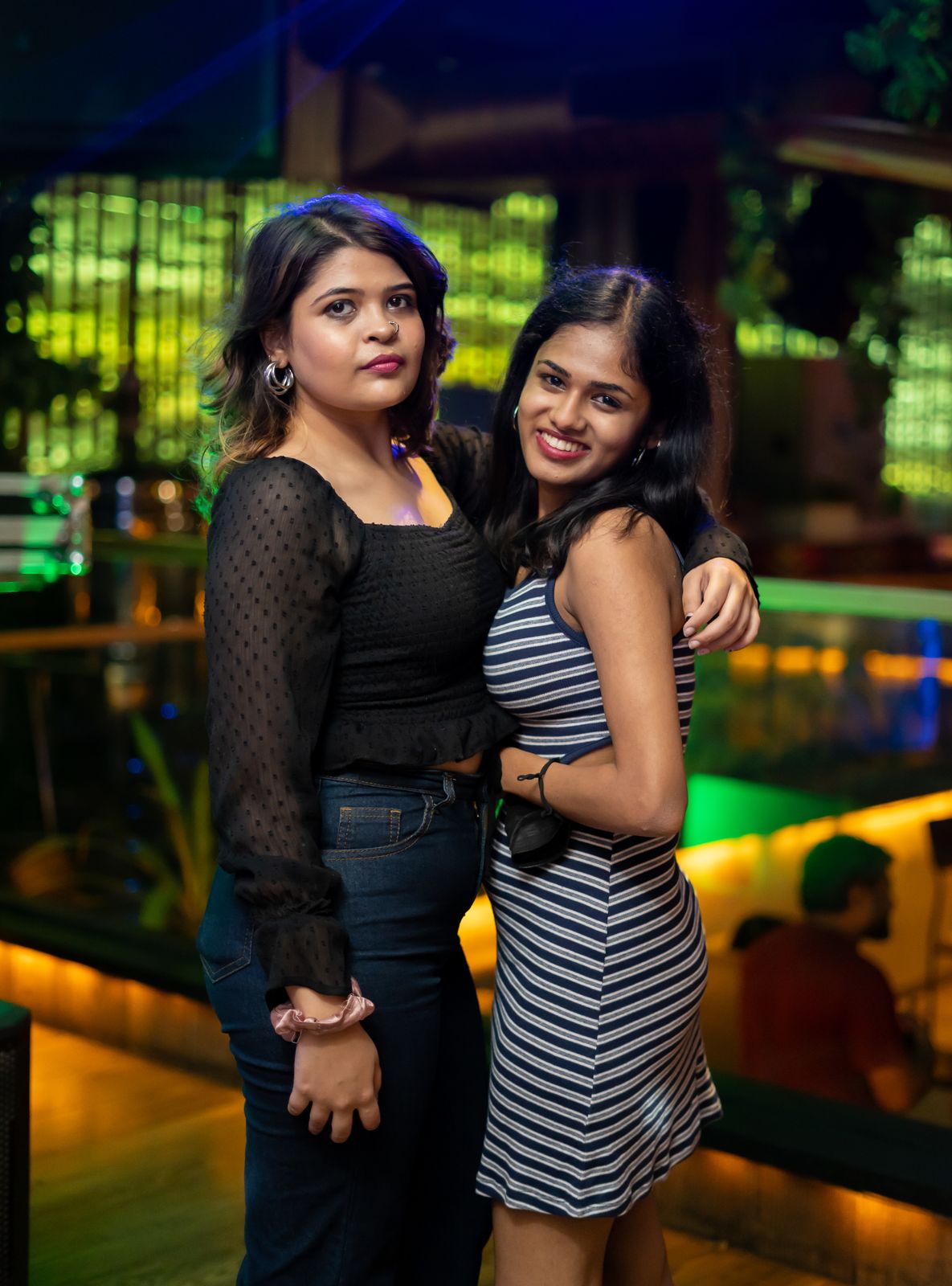 Friday night — two friends laughing