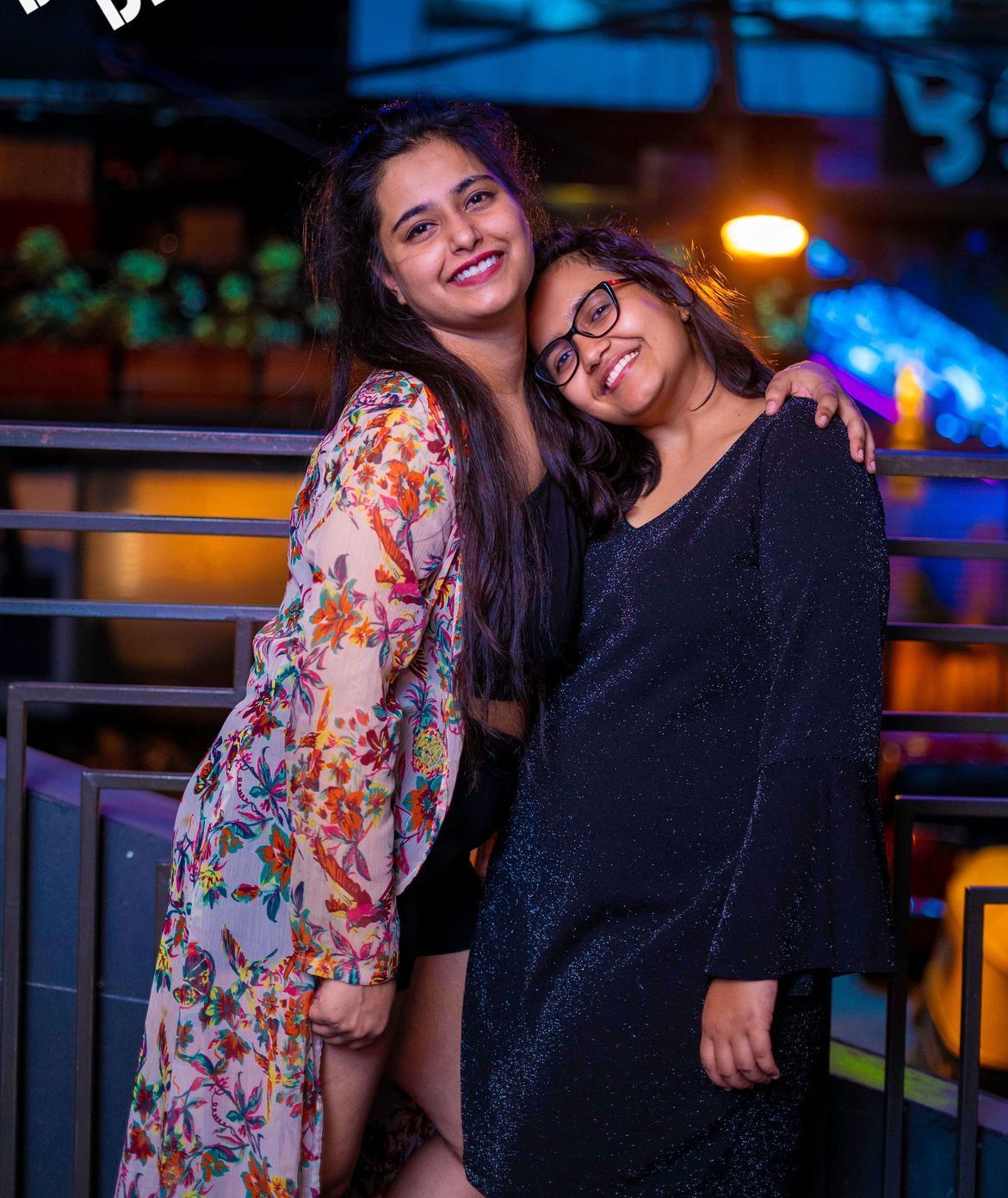 Nightlife frame — friends flash-lit