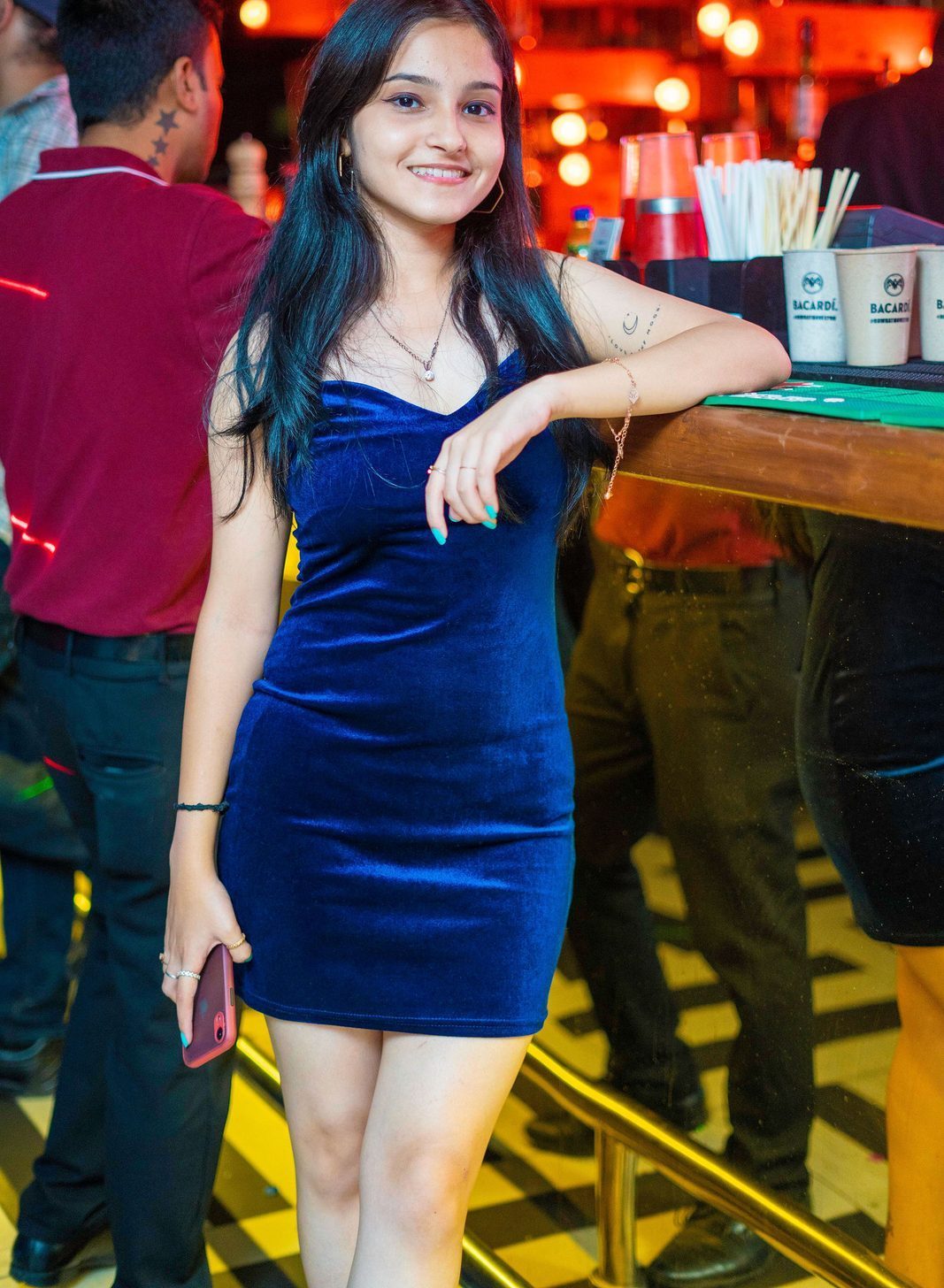 Party frame — velvet at the bar