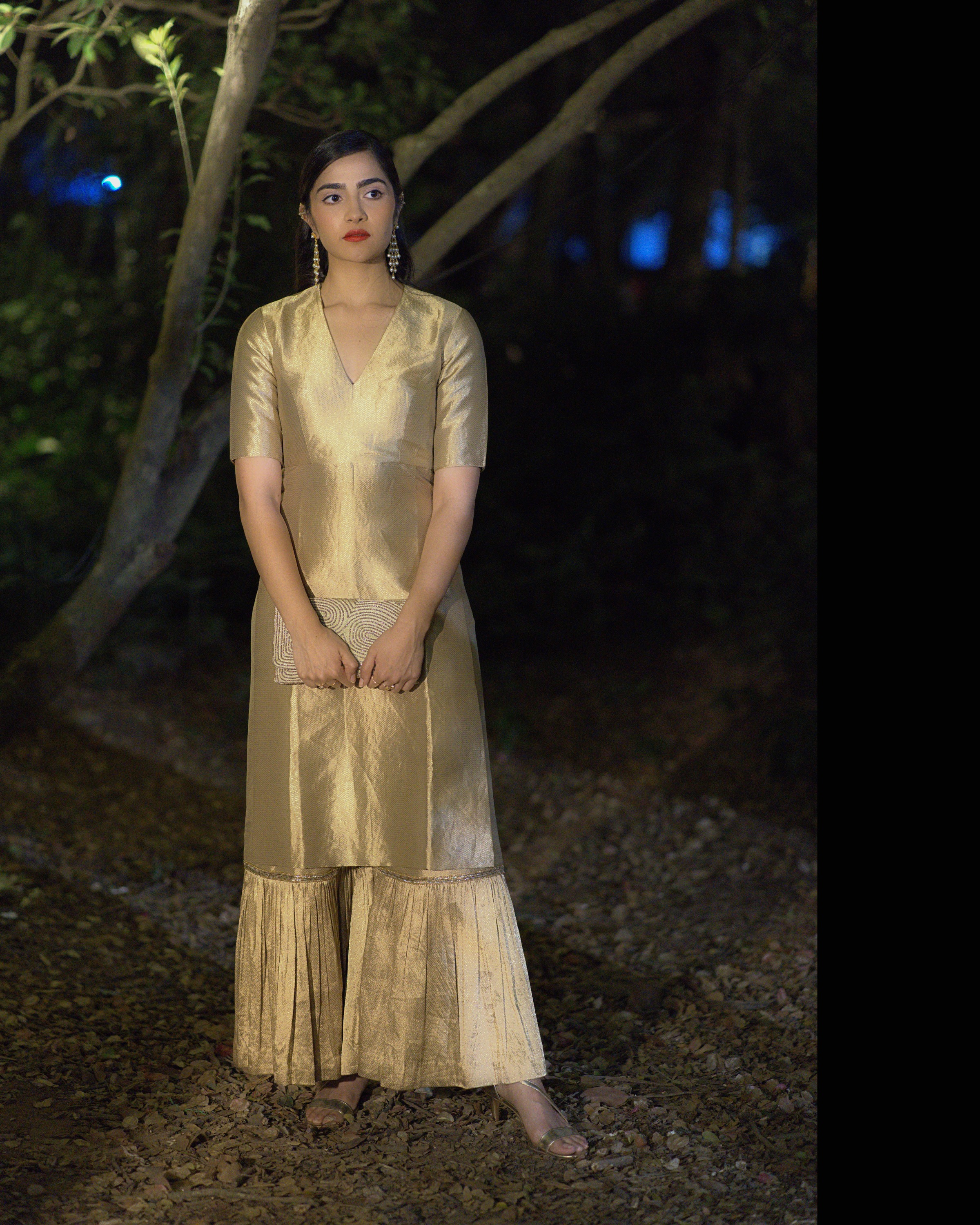 Rukmini Vasanth full length among the trees