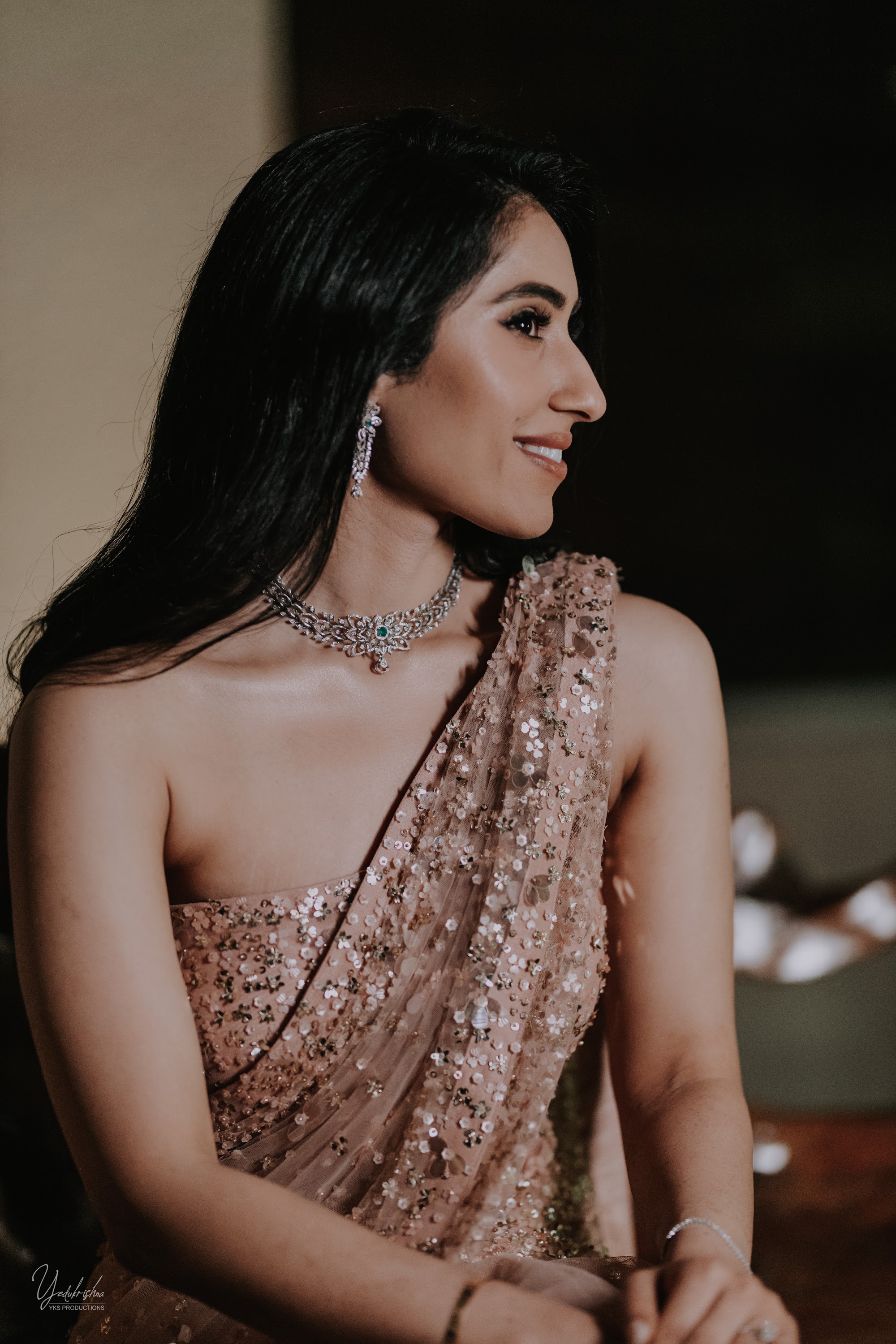 Portrait in rose-gold saree