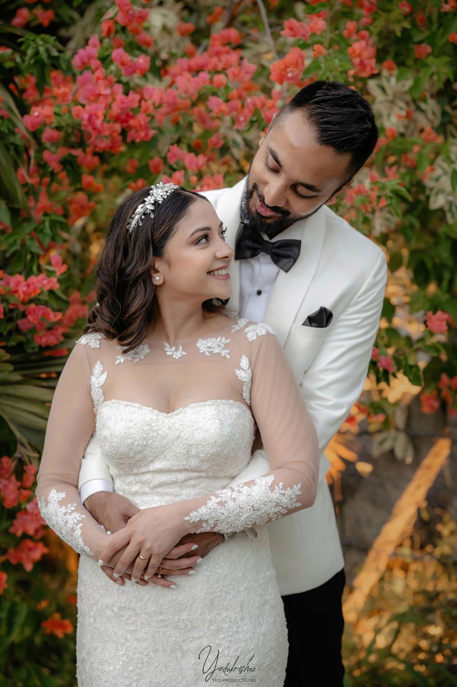 Couple portrait against the blossoms