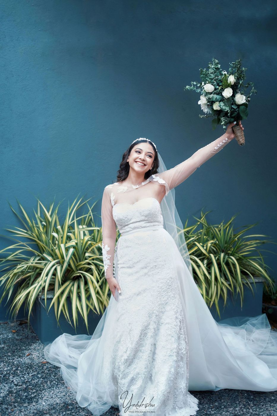 Bride raising the bouquet