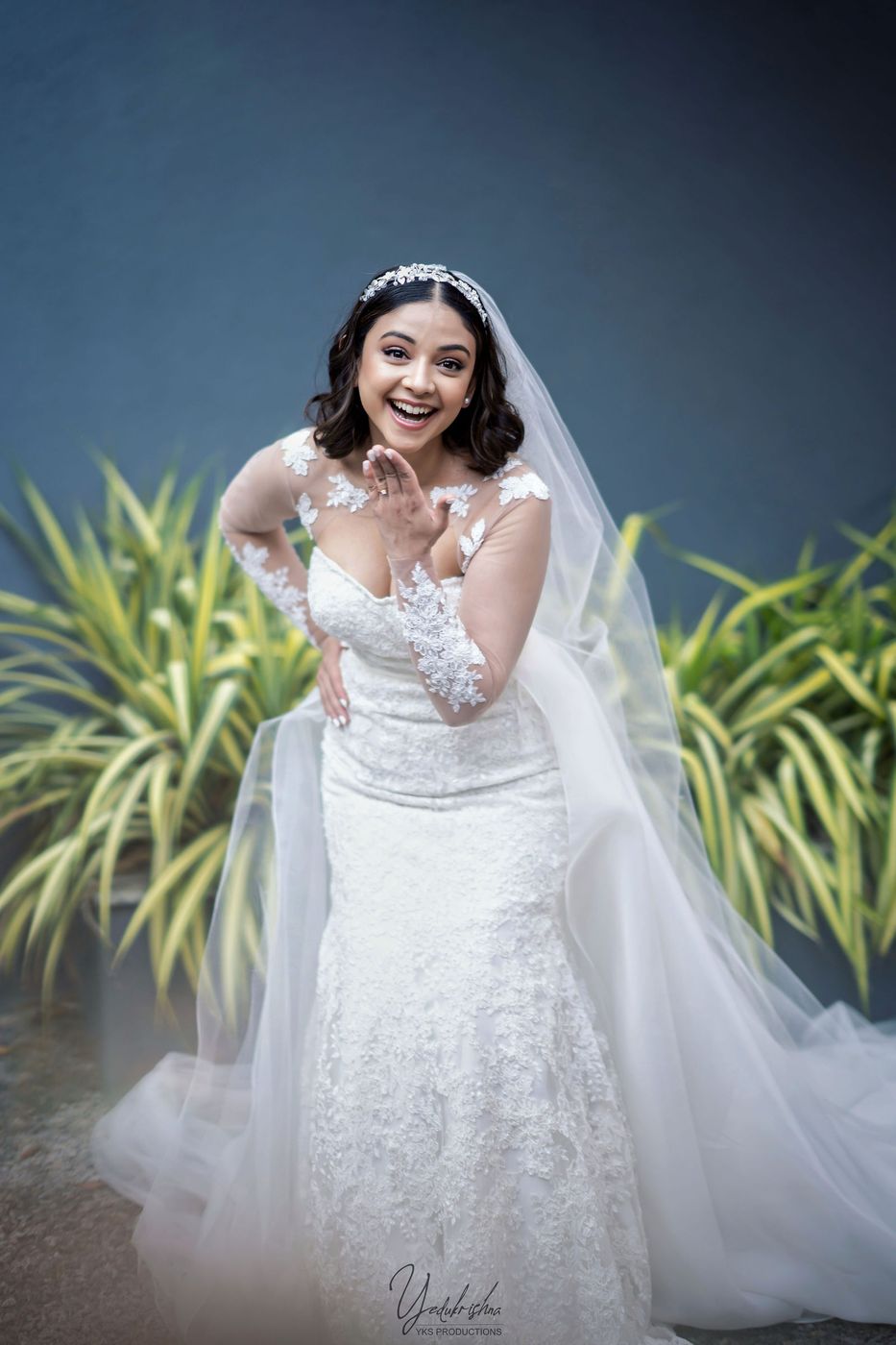 Bride laughing, veil down