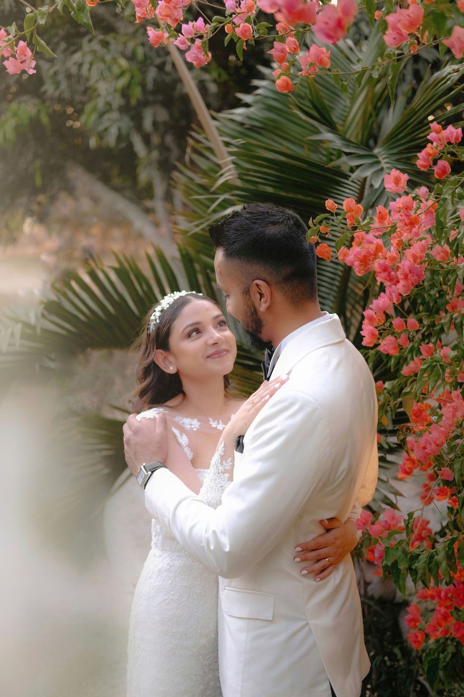 Couple embraced under the blossoms